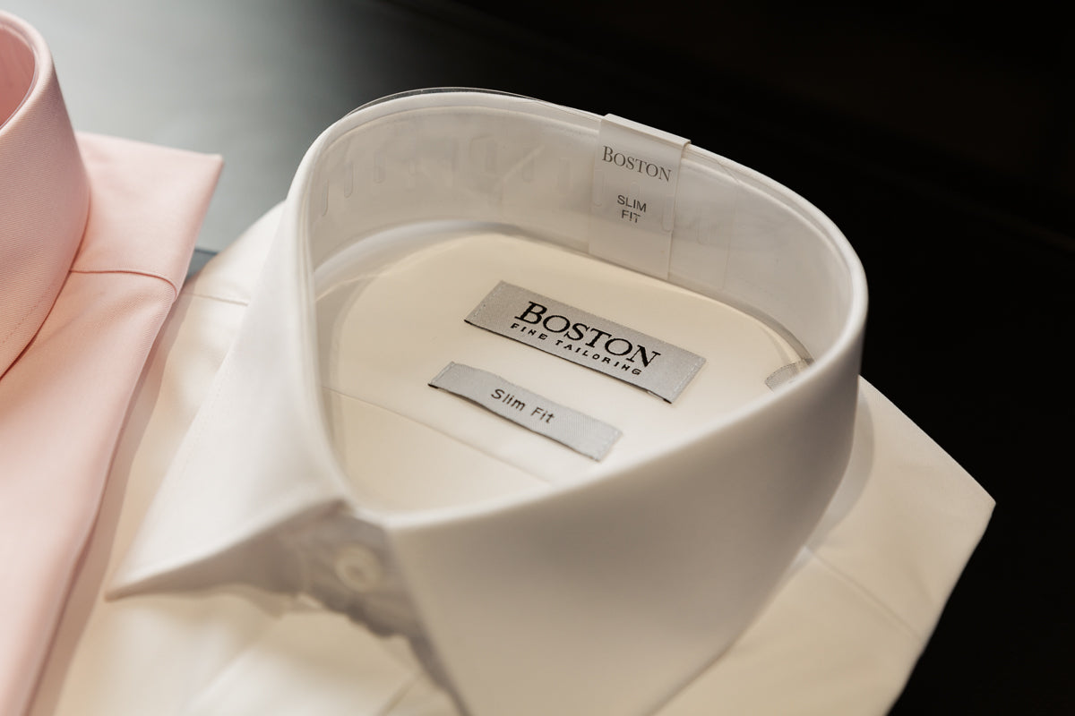 boston mens shirts in white and pink in store at mens suit warehouse