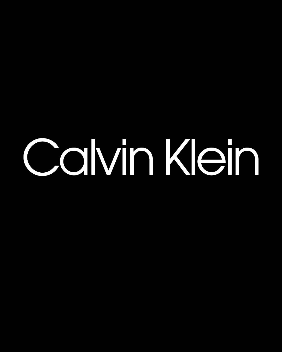 the traditional logo of calvin klein in whihte text with a black background