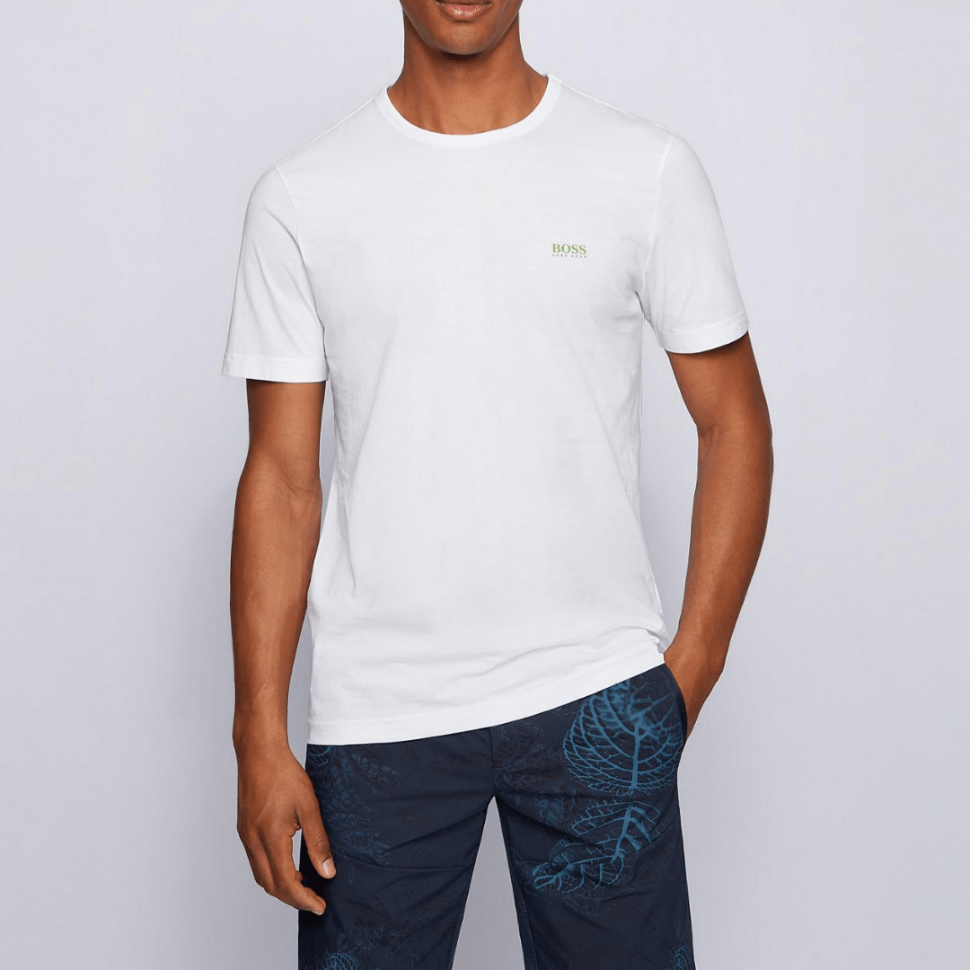 a model wears the hugo boss plain white tshirt with chest logo reading hugo boss