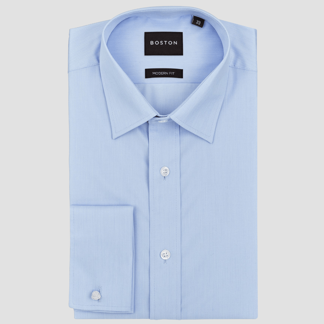 Boston’s Liberty Blue French cuff shirt in a modern slim fit with classic collar and tailored darts.