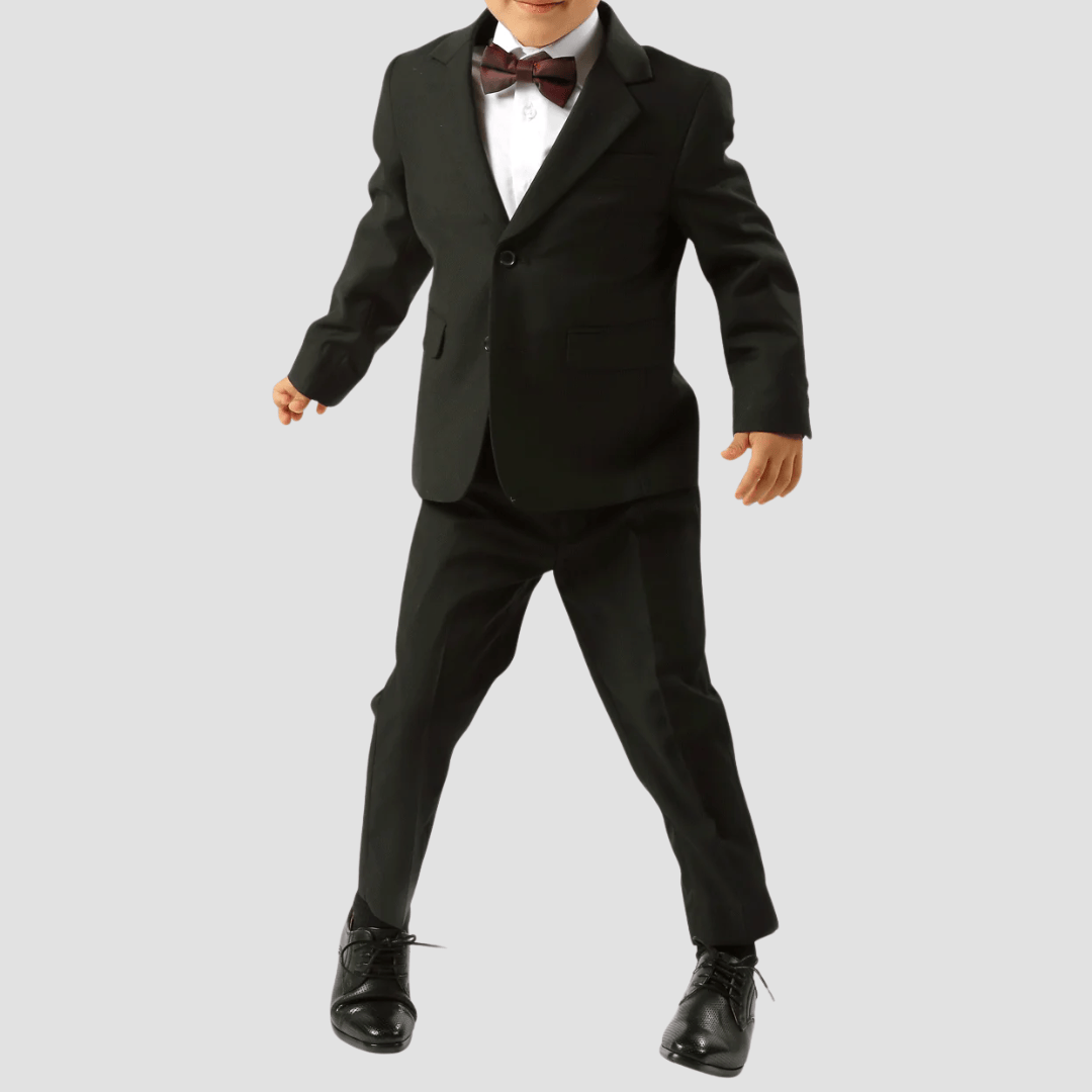 Child wearing a black suit with a white shirt and maroon bow tie