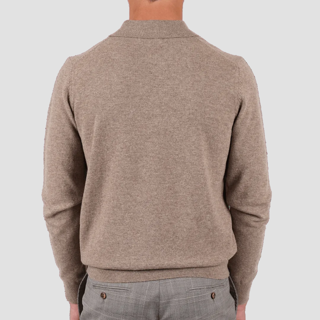 Back view of a person wearing a beige sweater on a transparent background