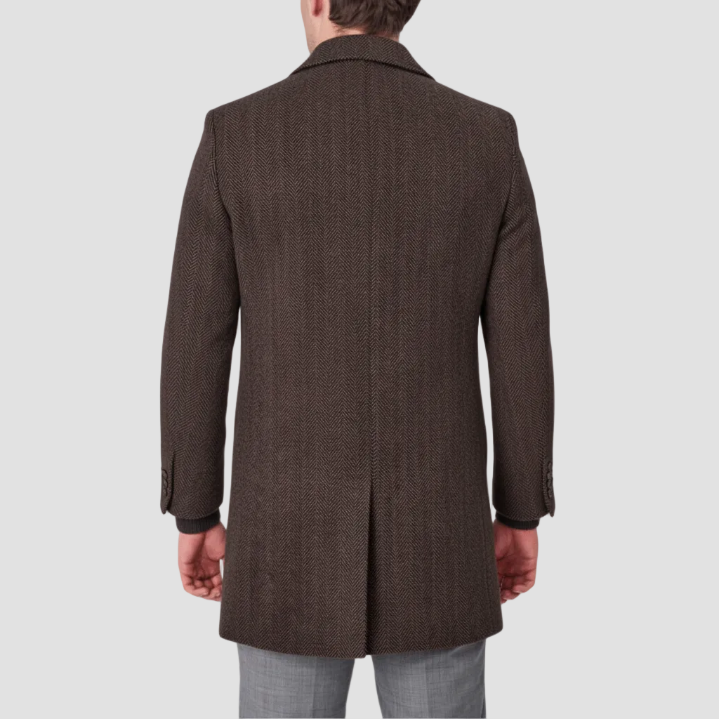 Brown coat with removable collar single vent at back by Savile Row.