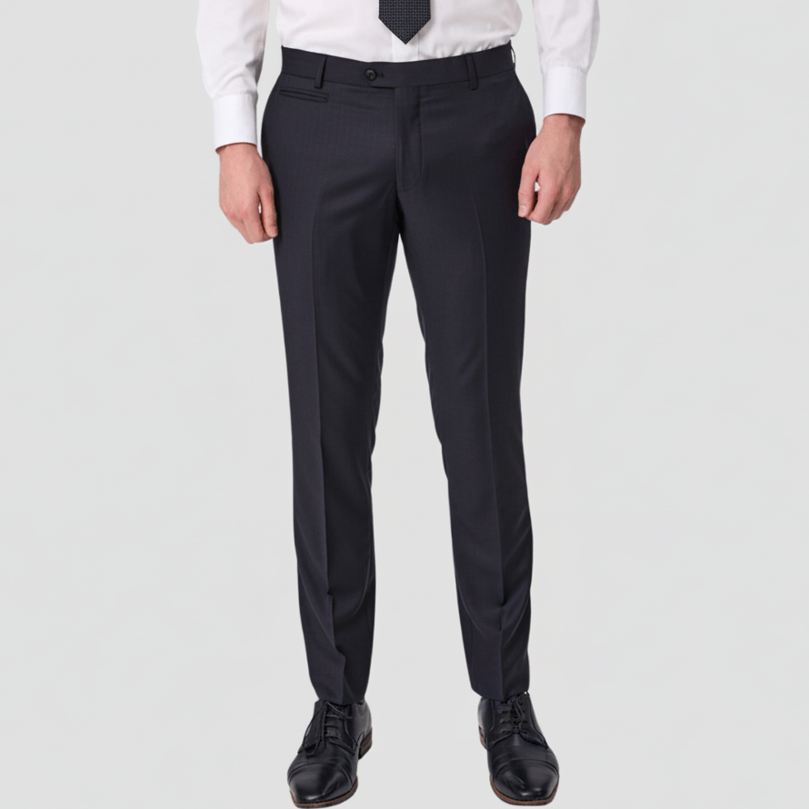 Black Tasmanian wool pants by Savile Row with a white shirt, black tie and leather shoes.