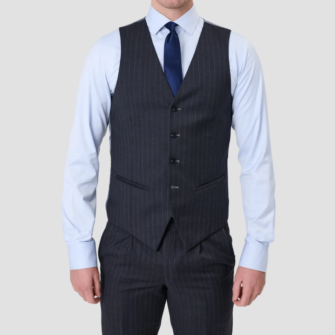 Charcoal pinstripe suit vest in Australian Merino Wool by Savile row with matching pants, a light blue shirt and royal blue tie.