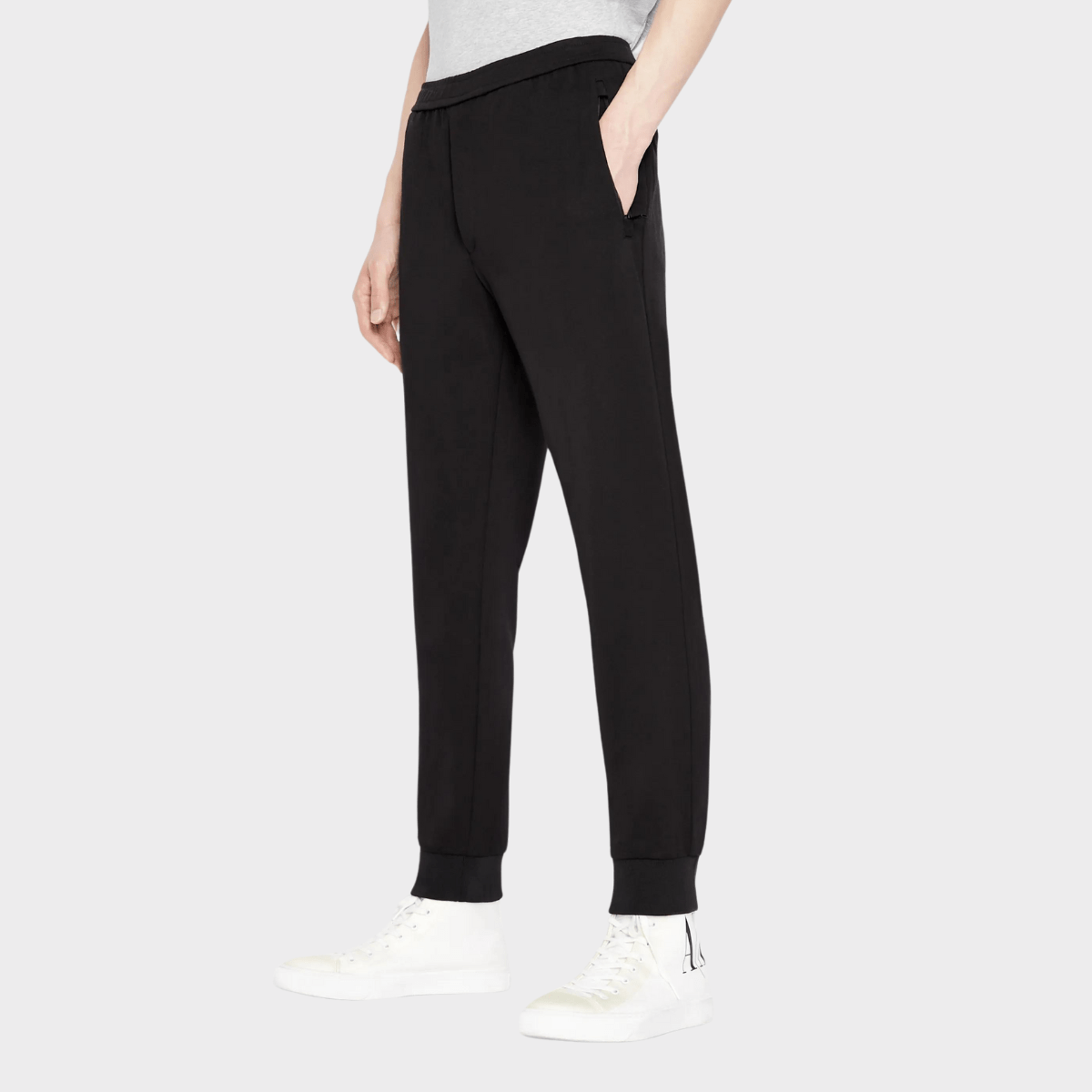 Close up view of the Armani black suit tailored pants.