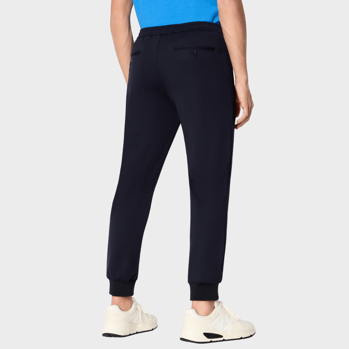 Back view of the tailored trousers by Armani in navy blue