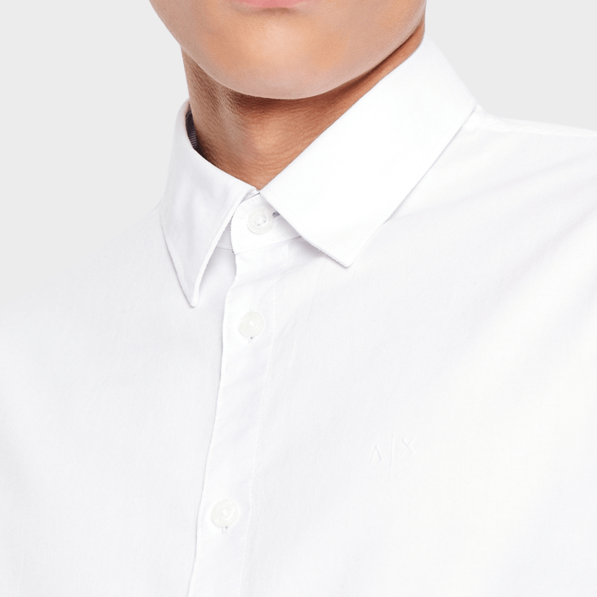 Collar details of the oxford business shirt in white by Armani.