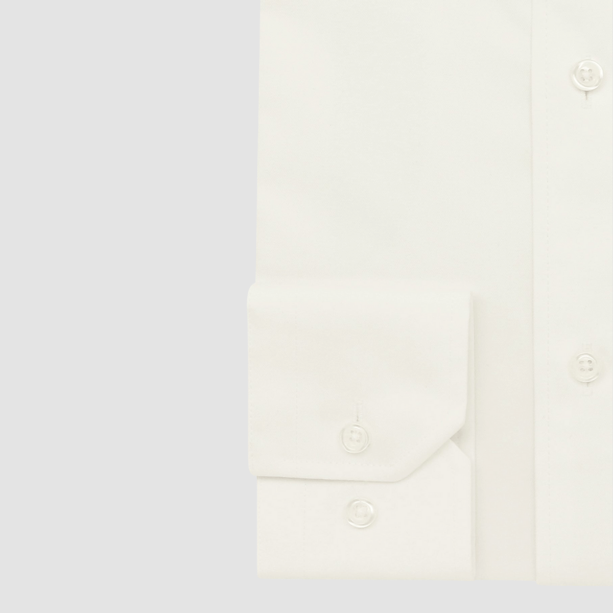 Boston’s Liberty cream business shirt in a modern slim fit with classic collar and tailored darts.