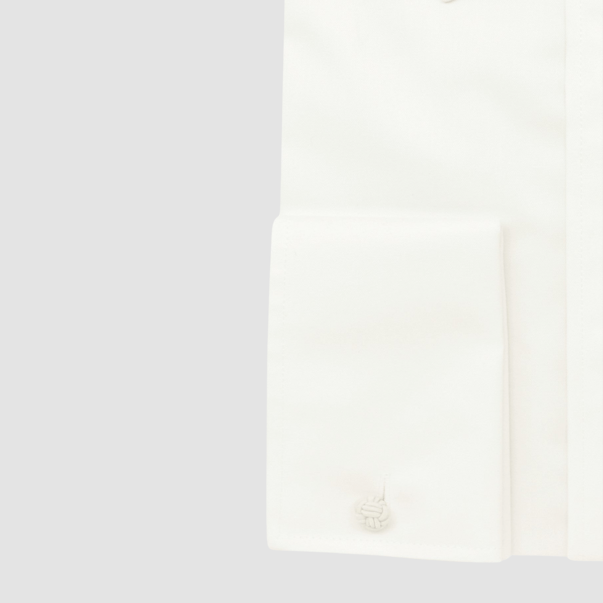 Boston’s Liberty Cream French cuff shirt in a modern slim fit with classic collar and tailored darts.
