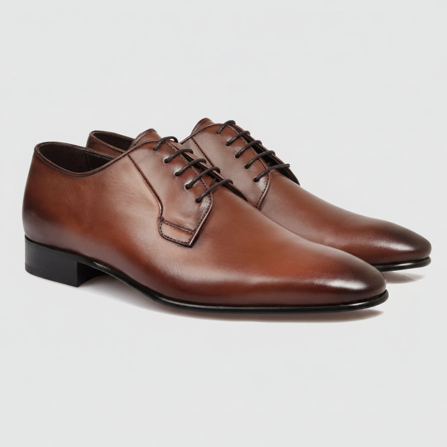 Men’s Ellis Derby shoes by Brando, crafted from polished leather with a chisel toe and stacked heel.