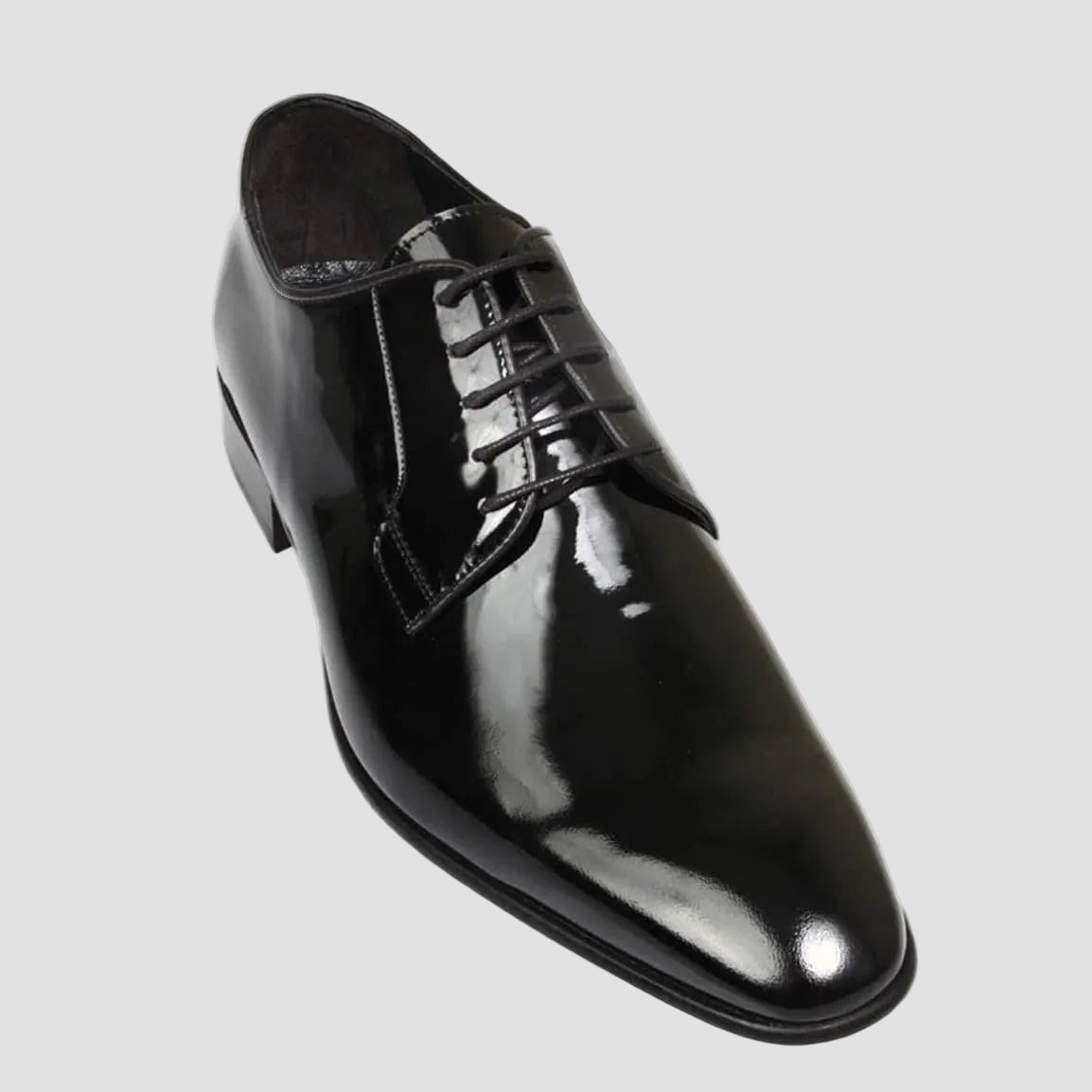 Men’s Ellis Derby shoes by Brando, crafted from polished leather with a chisel toe and stacked heel.