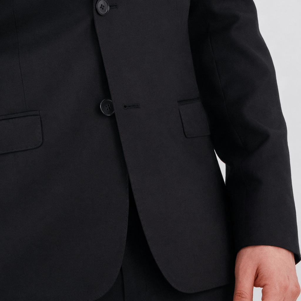 Bruton’s David Keystone slim‑fit black suit with performance finish.