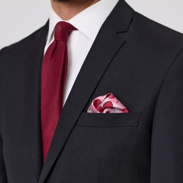 Bruton’s David Keystone slim‑fit black suit with performance finish.