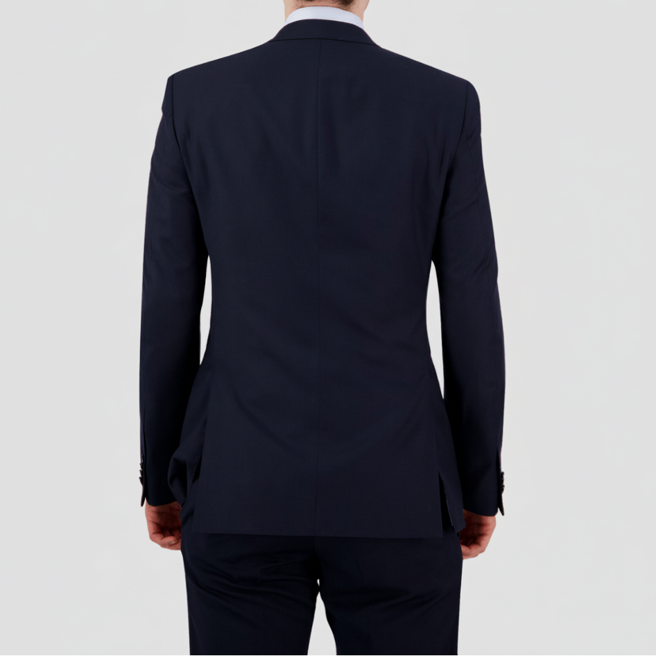 Bruton’s David Keystone slim‑fit navy suit with performance finish.