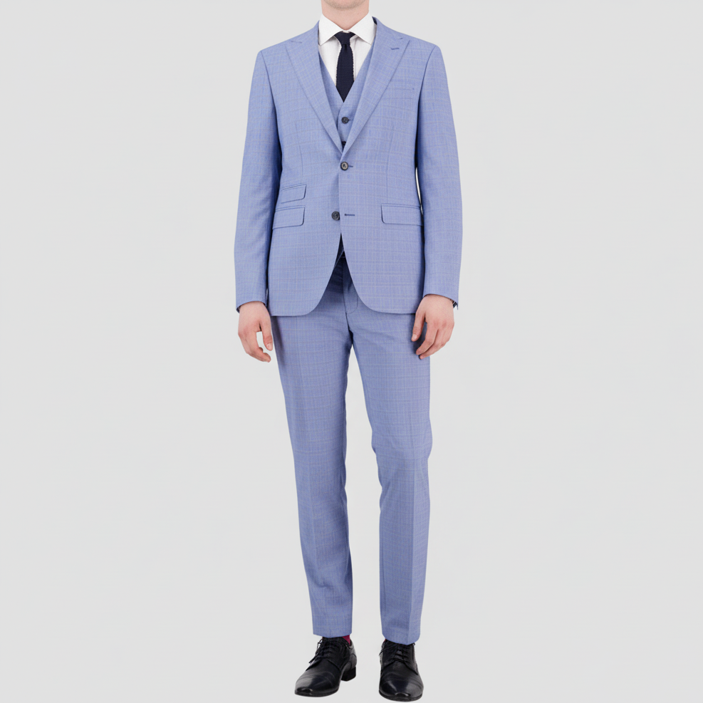 Bruton’s Jed Jadestone Sky Suit—slim fit with peak lapel, sharp tailoring and a polished performance finish.