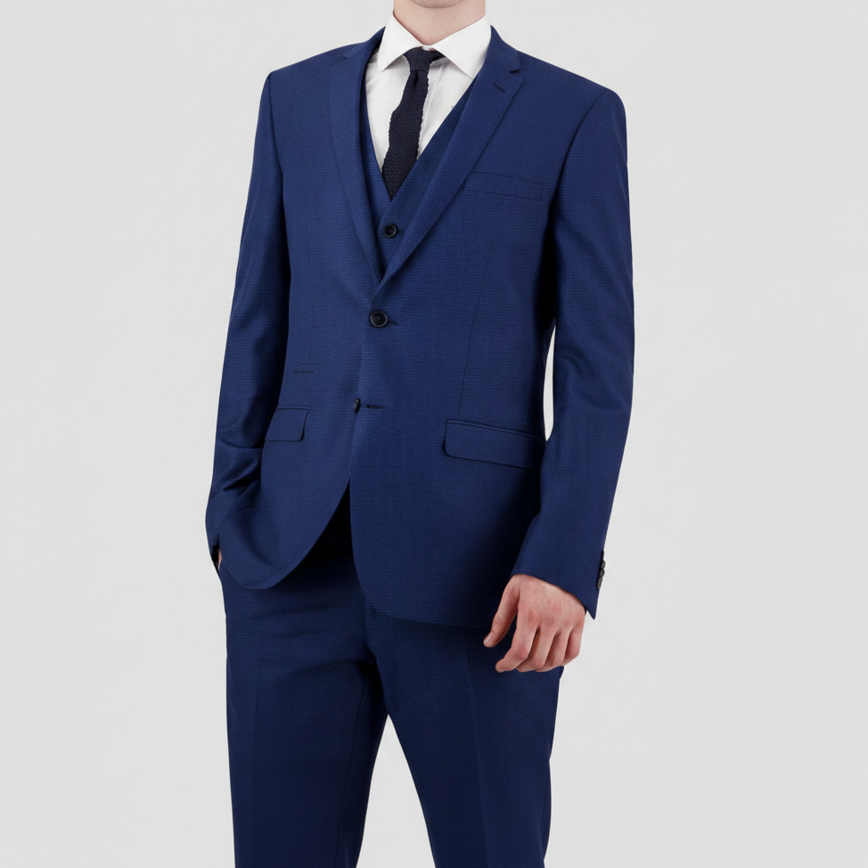 Bruton’s Jose Jadestone slim‑fit blue-black houndstooth suit with performance finish, tailored jacket and trousers.