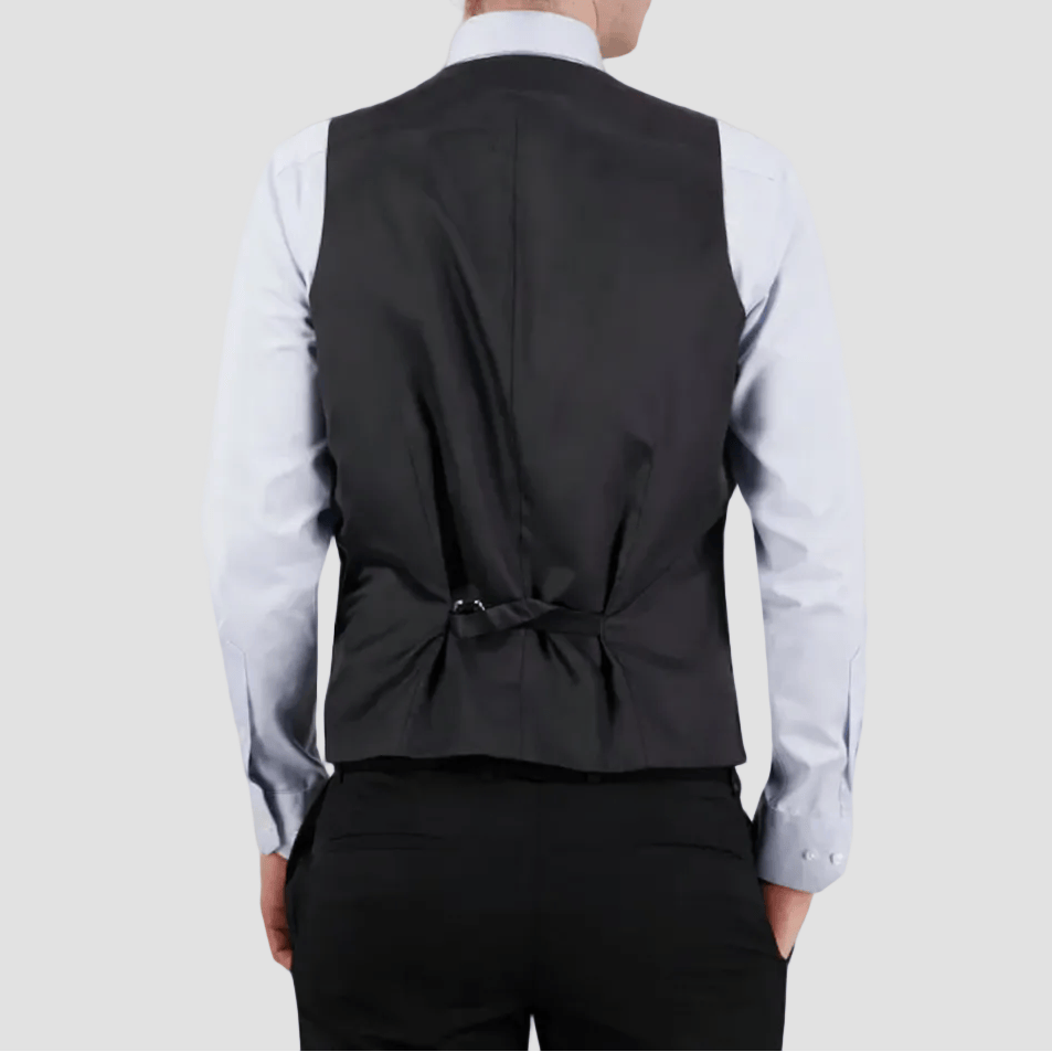 Bruton’s Saul Keystone slim‑fit vest—four‑button design, angled pockets, and seamless pairing with Bruton suits.