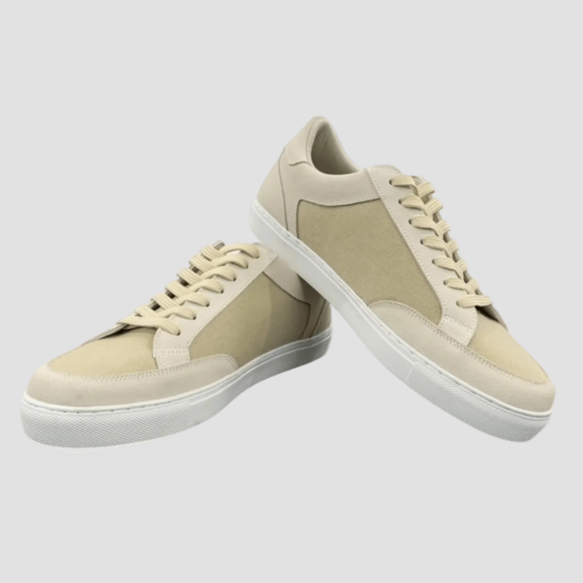 A pair of beige Calmino men's canvas sneakers with lace-up closure and a white sole.