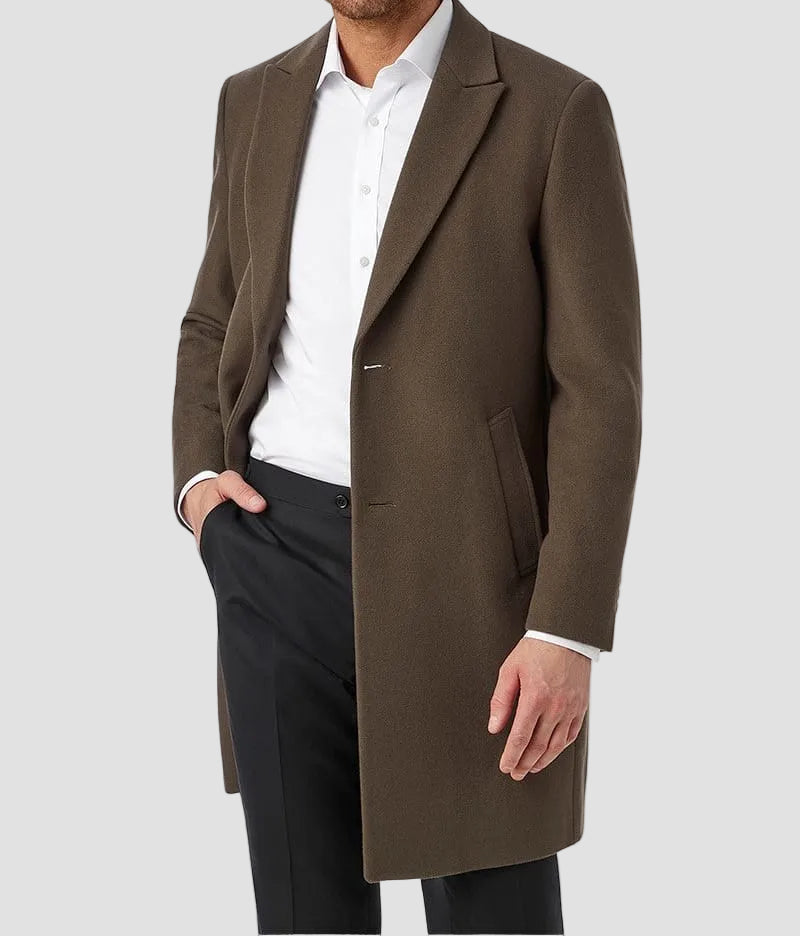 Man wearing a brown overcoat on a white background