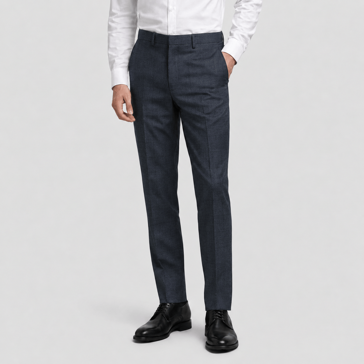 Daniel Hechter’s navy Edward slim fit trouser in Australian Merino wool with stretch and subtle check.