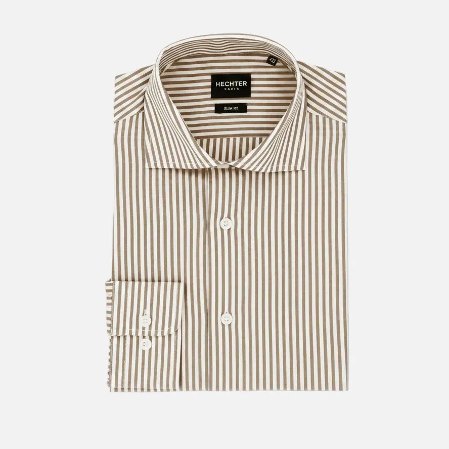 A folded Hechter Paris slim fit dress shirt with vertical beige and white stripes, featuring a pointed collar, white buttons, and a folded cuff.