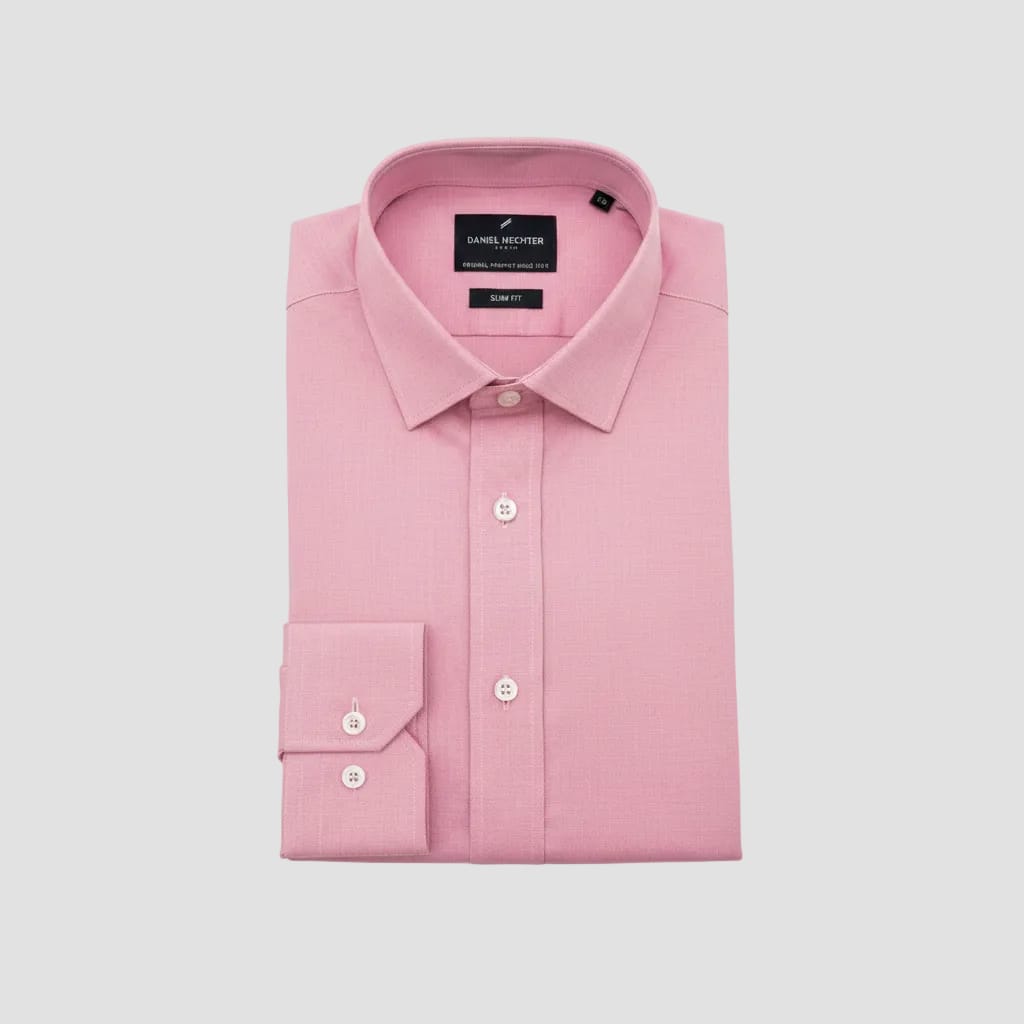 Pink dress shirt with a brand label in clear plastic packaging.