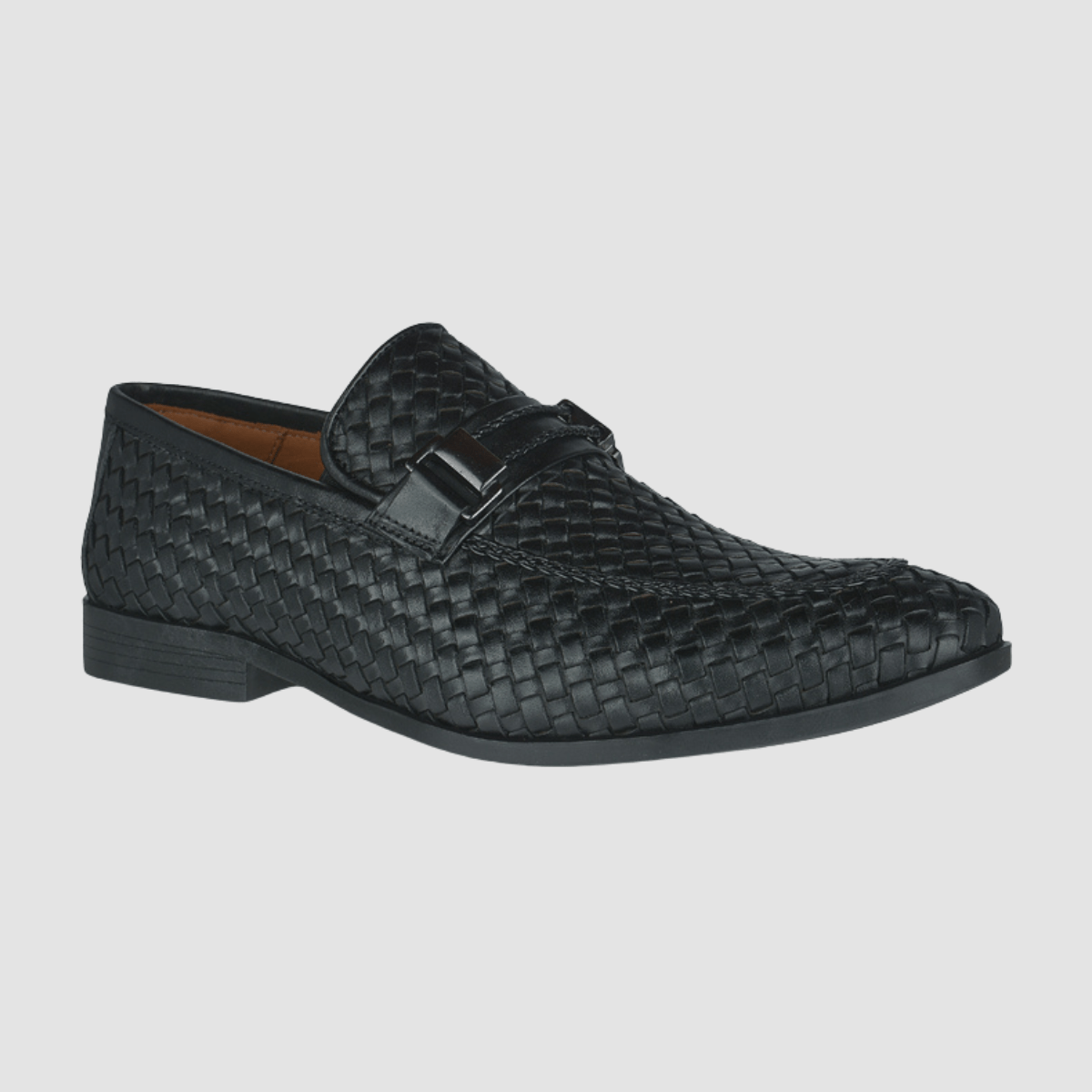 Black textured leather loafer by Ferracini with a slip-on design and metal buckle closure.