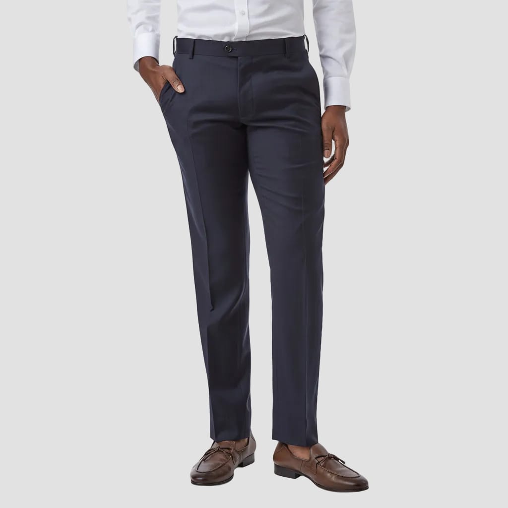 dark navy dress pants worn with a white shirt and brown shoes