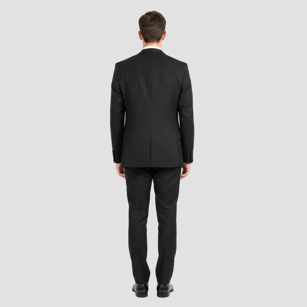 Dark coat hanging on a rack in a store setting
