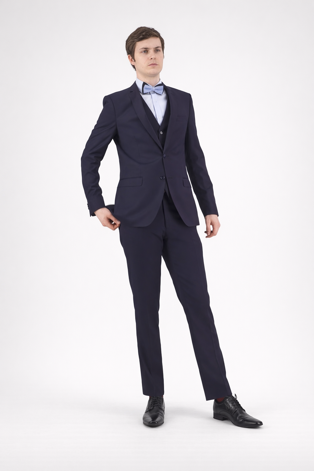 Bruton’s David Keystone slim‑fit navy suit with performance finish.