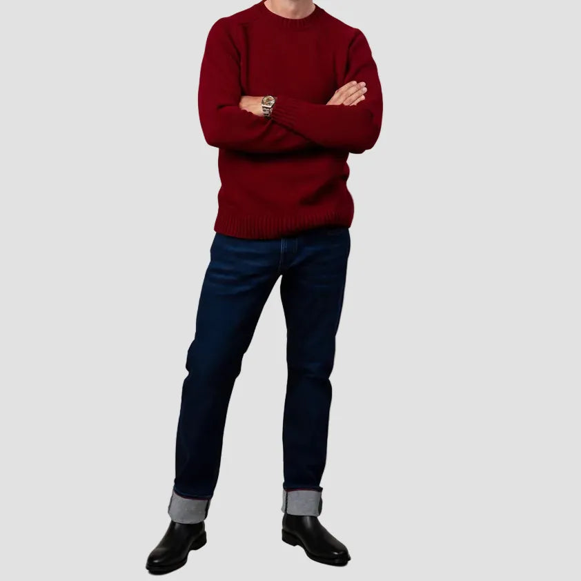 Men’s Austin Jean in mid‑blue washed stretch denim, offering a relaxed tapered fit with natural fading and all‑day comfort.
