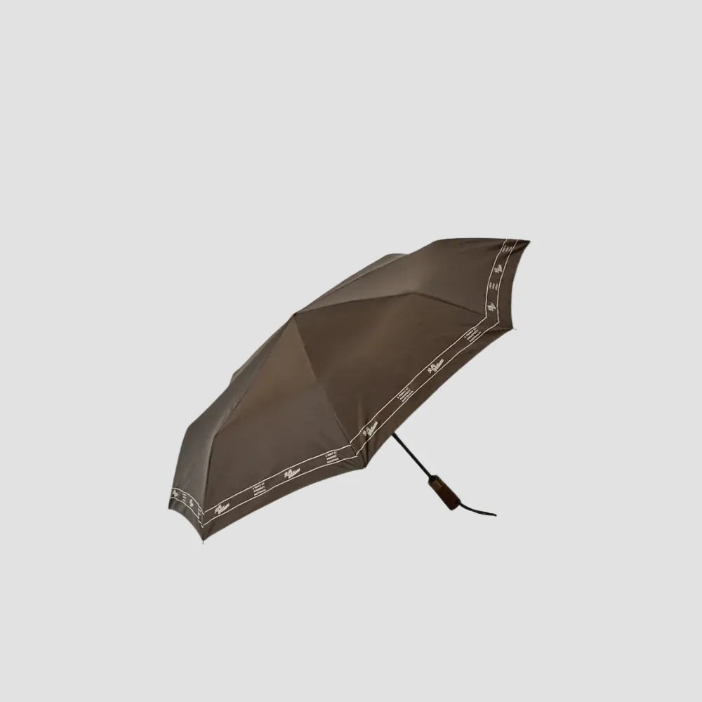 Brown umbrella with decorative band on a white background