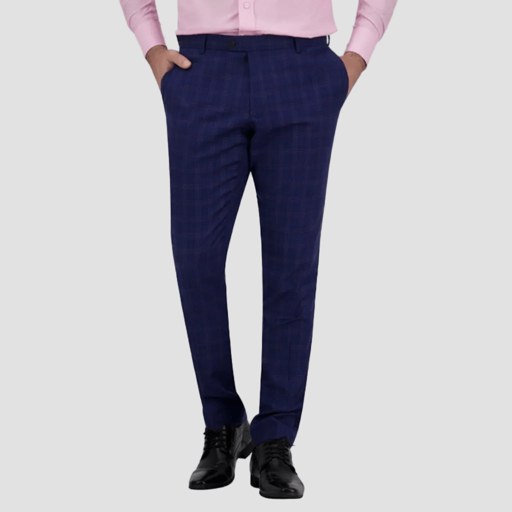 Azure blue patterned pants by Savile Row worn with a pink shirt and black leather shoes.