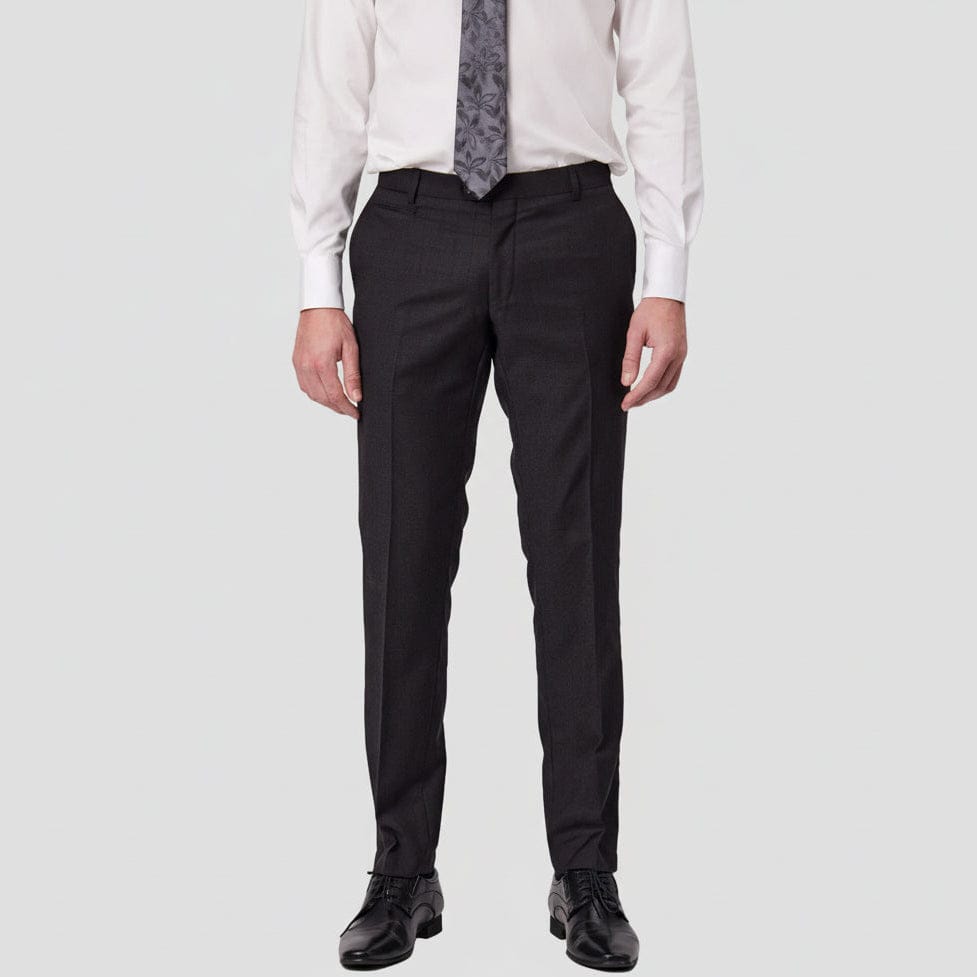 Charcoal dress pants in Australian merino wool by Savile Row worn with a white shirt, grey patterned tie and black leather shoes.