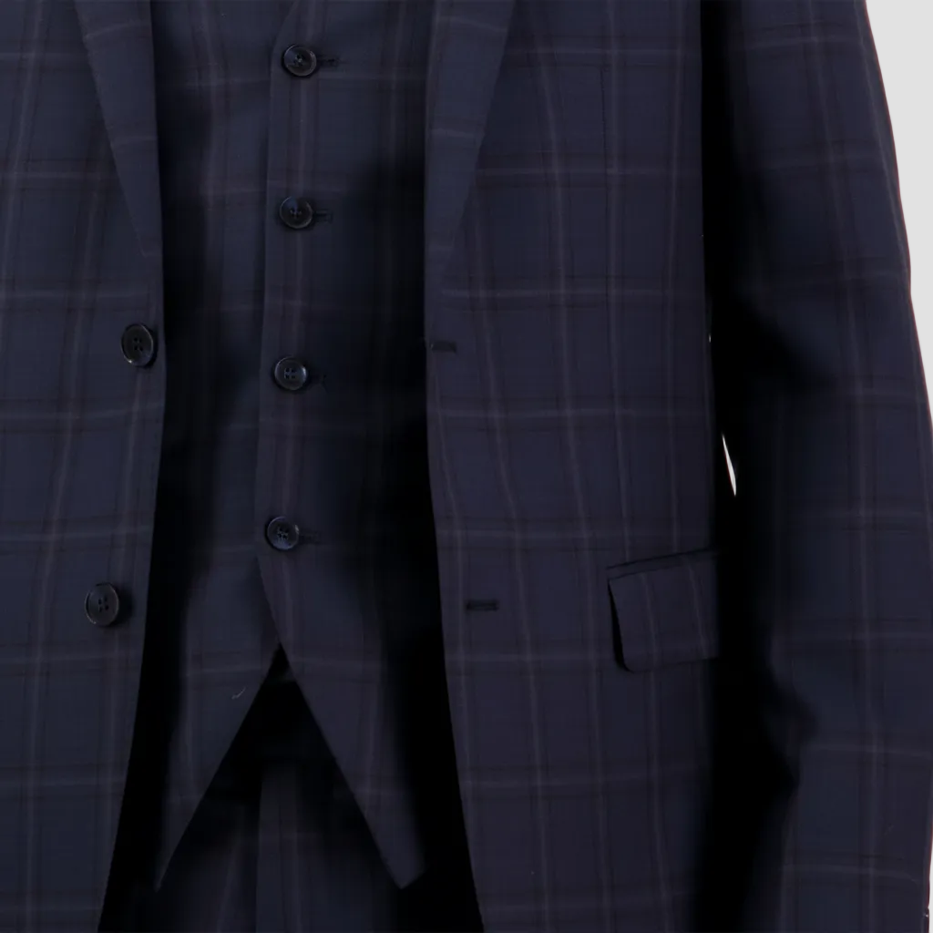 Super 120’s Merino Wool and a tailored silhouette define the midnight check Abram Suit.