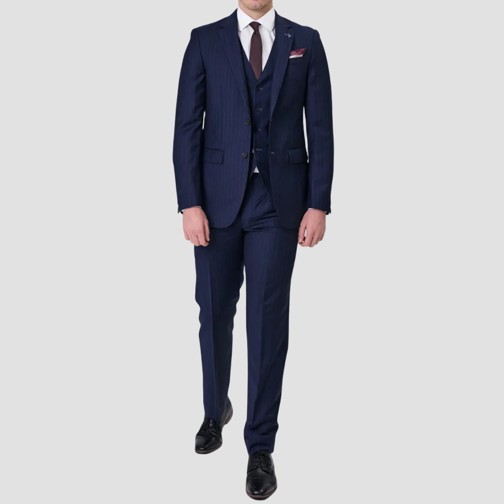 Navy stripe suit in Australian merino wool by Savile Row with a maroon tie and pocket square, and black leather shoes.