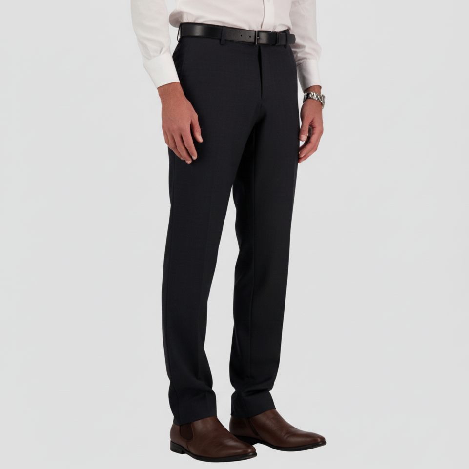 A classic fit charcoal trouser by Savile Row, with a white shirt and leather tan leather shoes.