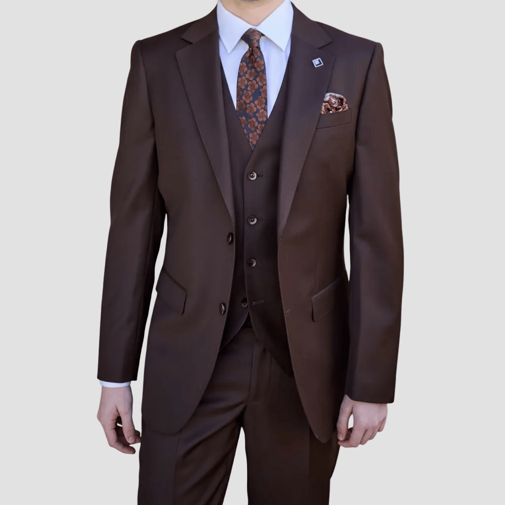Chocolate single breasted merino wool suit by Savile Row with trousers, vest and patterned tie and pocket square.
