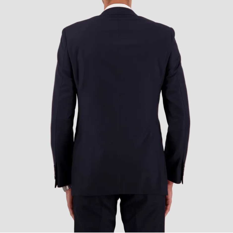Navy Big Men’s tailored travel suit in Super 110s Merino wool by Savile Row.