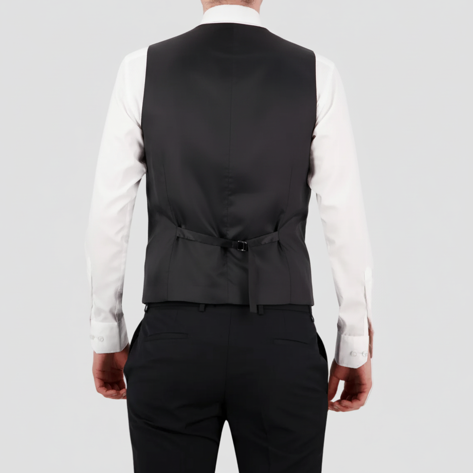 The Black Saul Survivor Vest—tailored fit, four‑button front, and satin back.