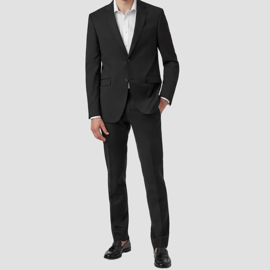 Black suit with white shirt on a light gray background