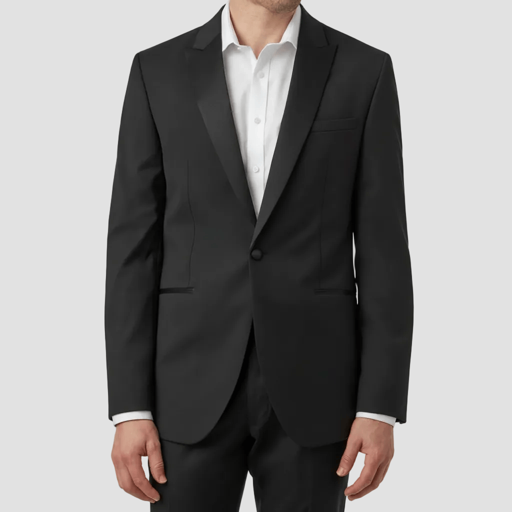 Black suit jacket with white shirt on a light gray background