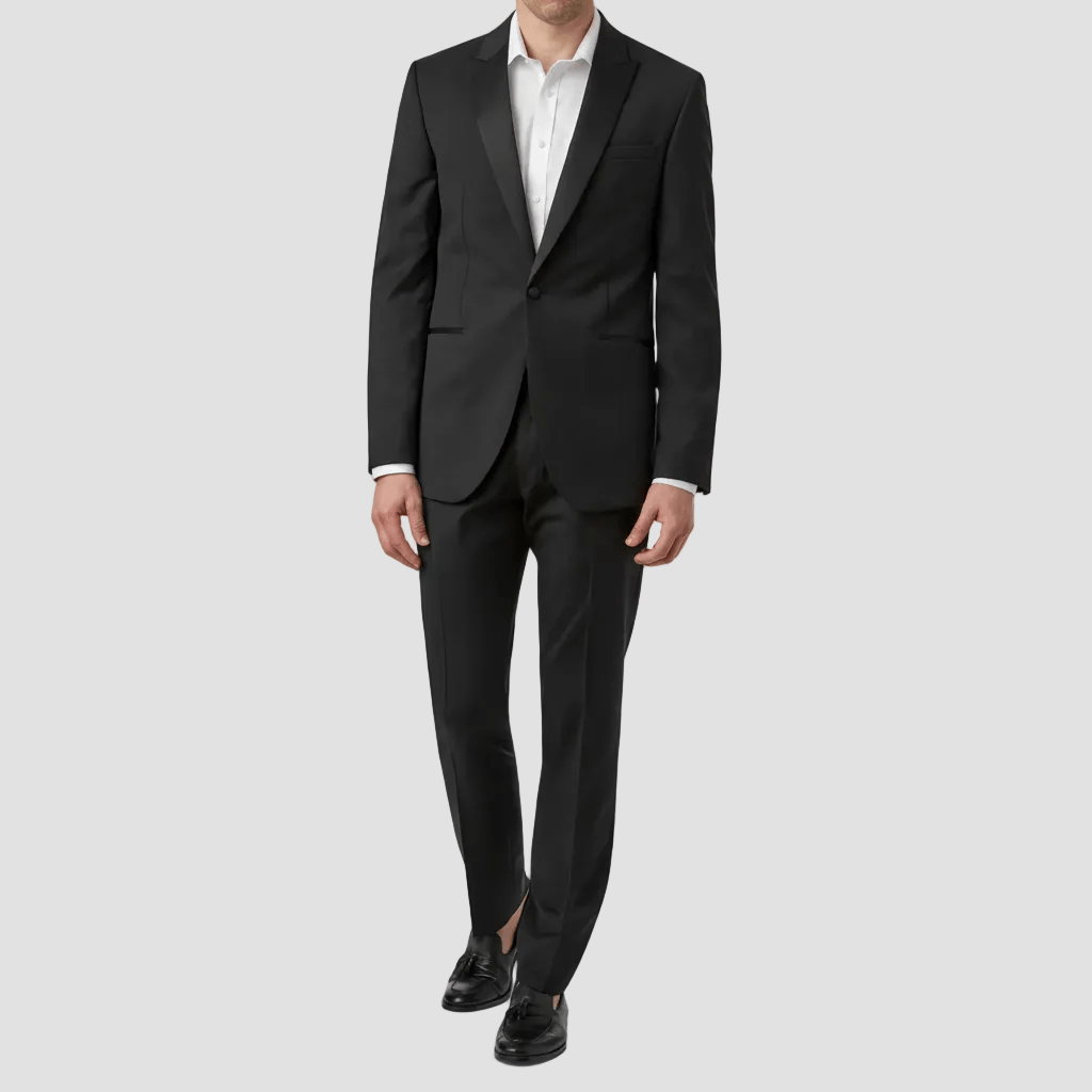 Black suit with white shirt on a light gray background
