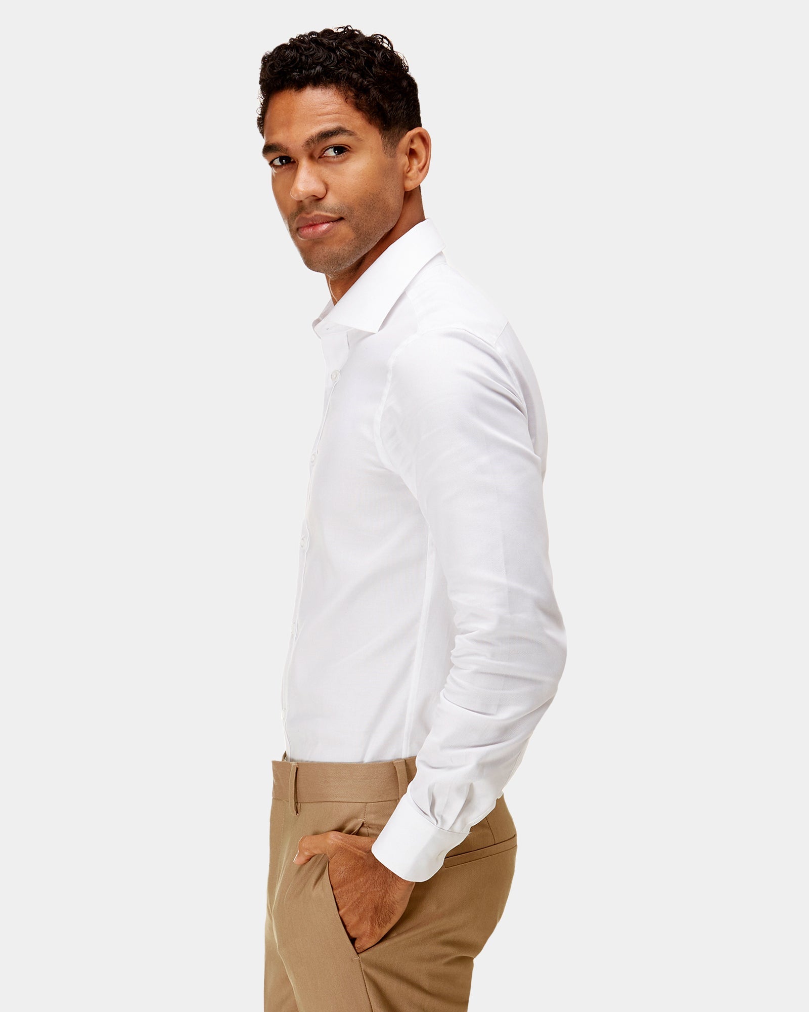 a side view of the brooksfield mens white business shirt in white