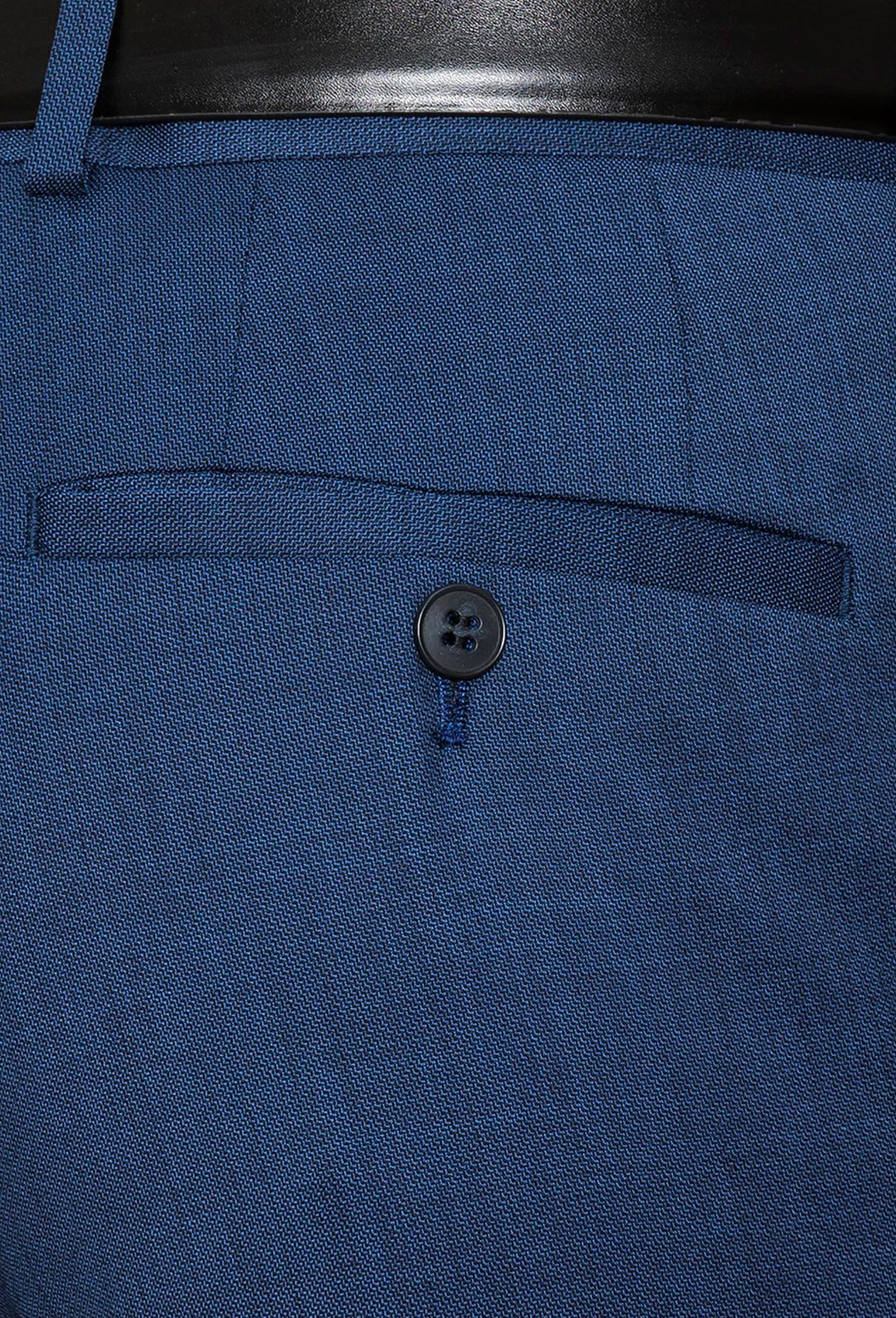 a close up view of the hip pockets on the Gibson slim fit caper trouser in blue pure wool FGD019