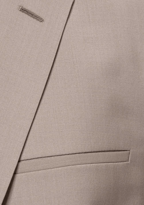 a close up of the lapel detail and front pocket seams aswell as showing the textured wool fabric on the hugo mens suit