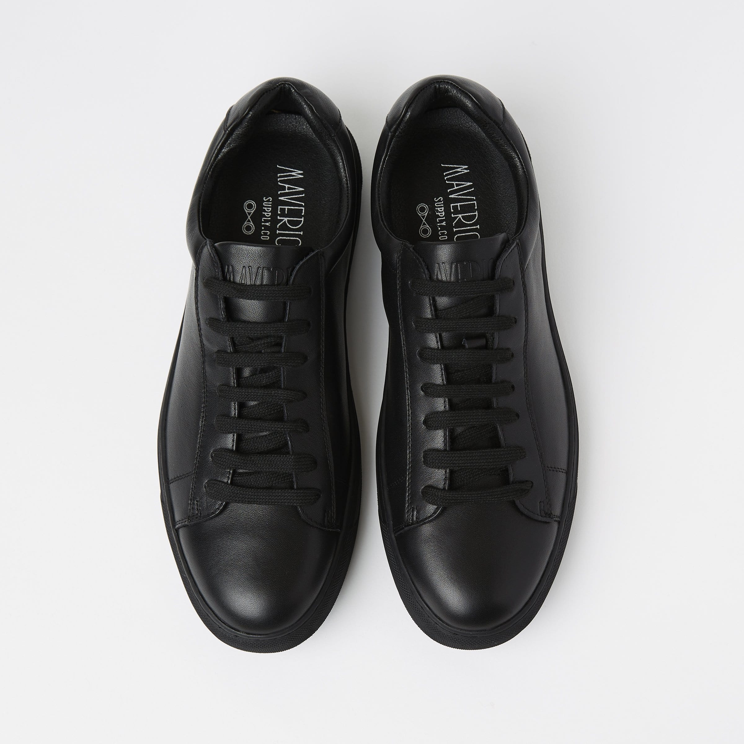 a birds eye view of a pair of black leather mens dress sneakers by mavericks