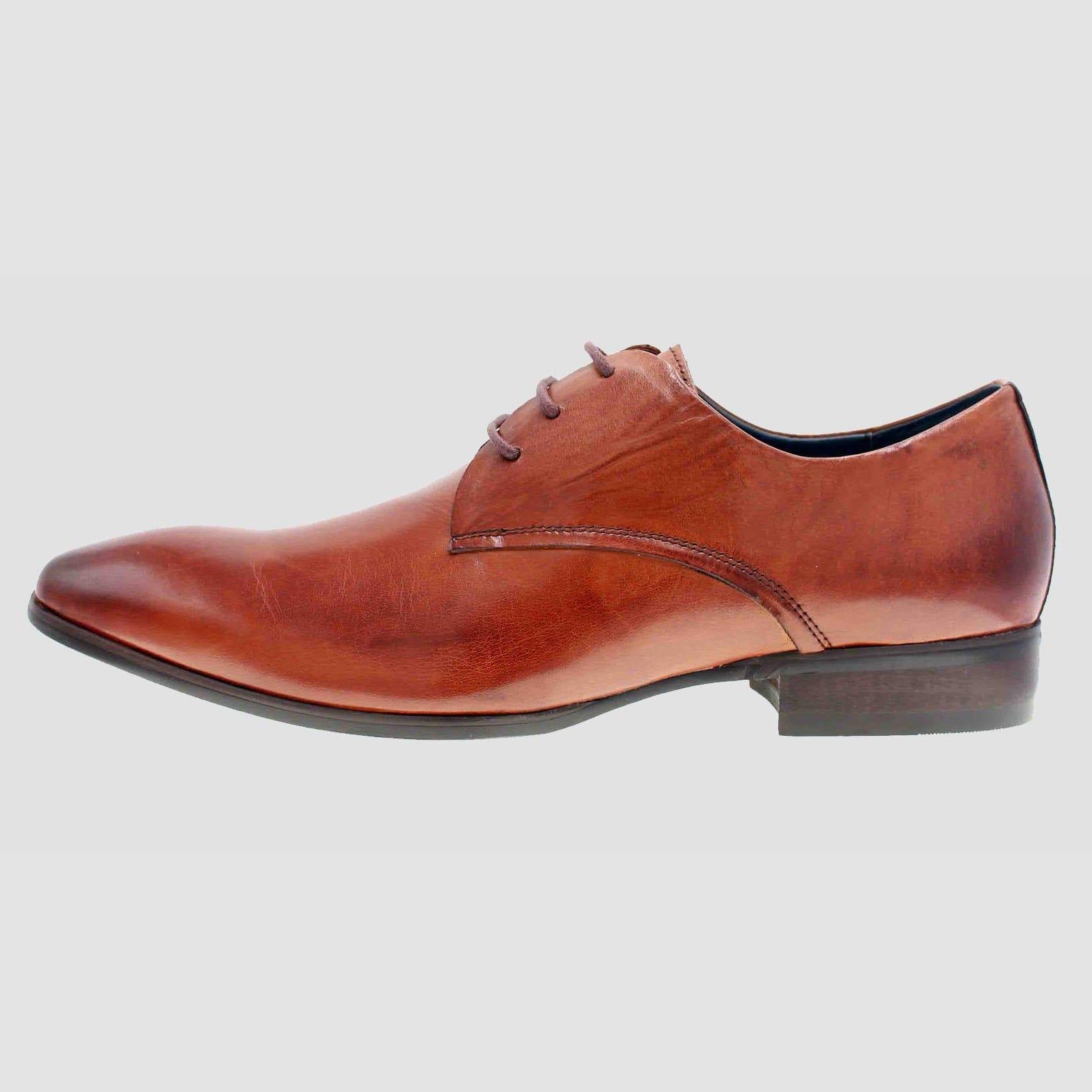 a side on view of the martino carolus leather lace up shoe in dark tan FM194M