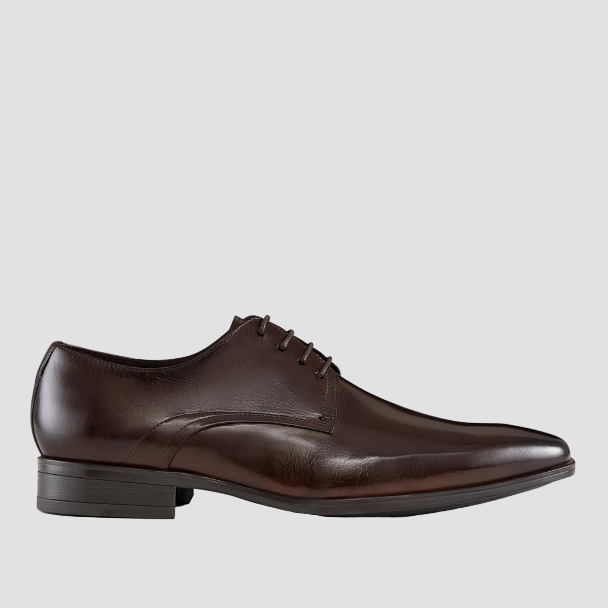 a side view of the classic markus mens brown dress shoes from aquila
